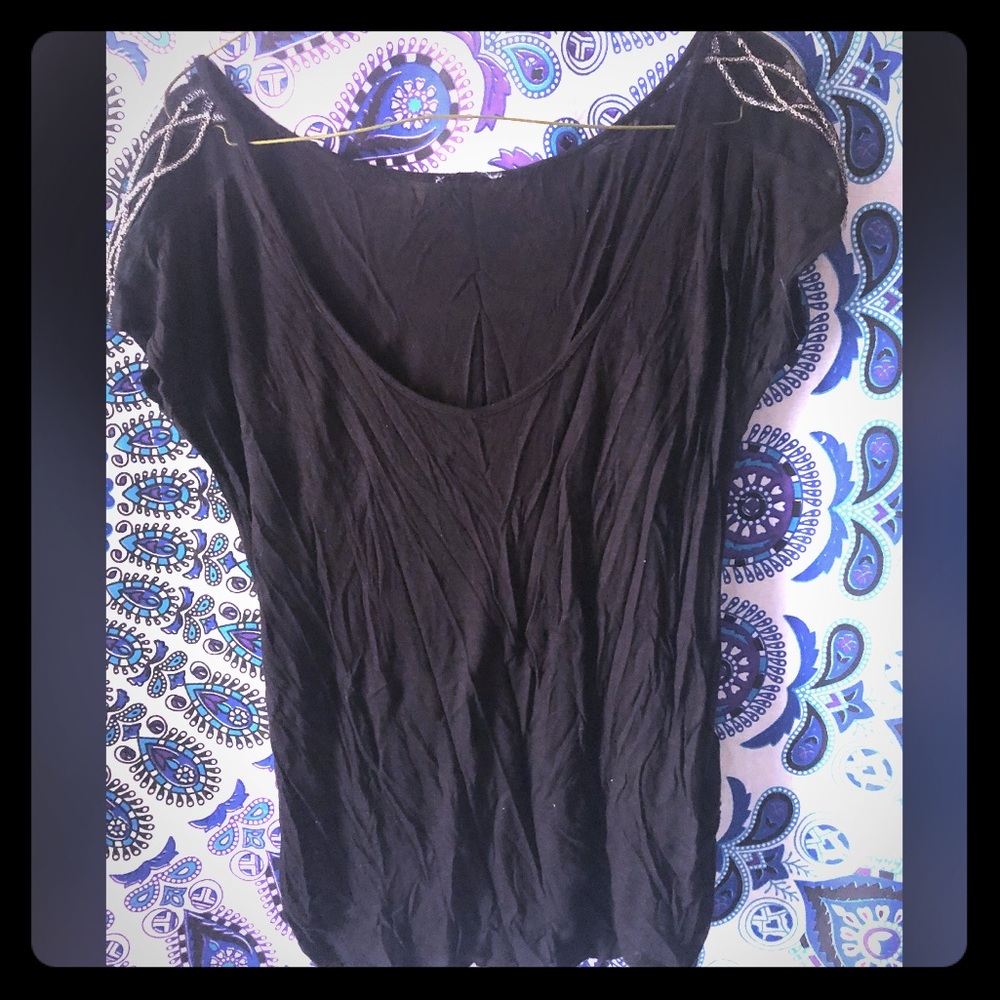 Black top with shoulder accents